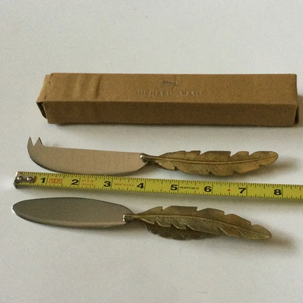MICHAEL ARAM SET OF 2 FEATHER HANDLED CHEESE KNIVES NWT